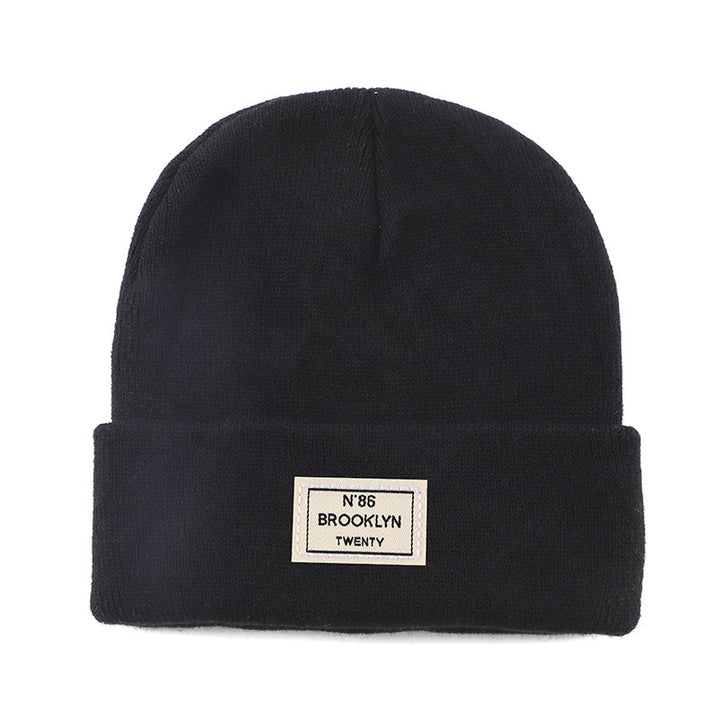 Knitted Beanie With Brand Label Stylish And Fashionable