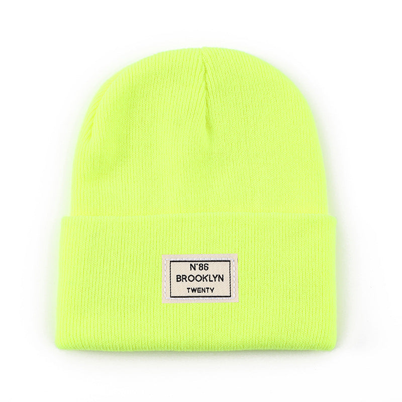 Knitted Beanie With Brand Label Stylish And Fashionable